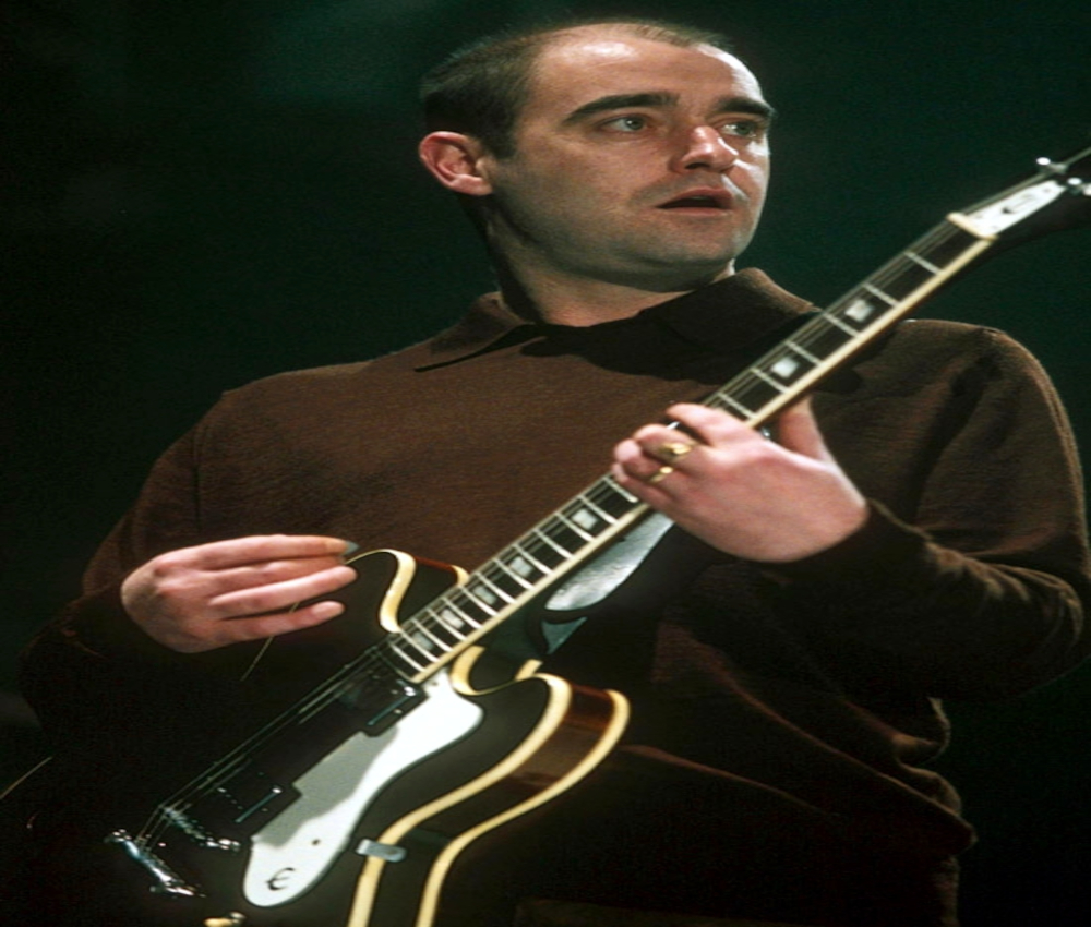 Bonehead Leaves Oasis at the End of an Era